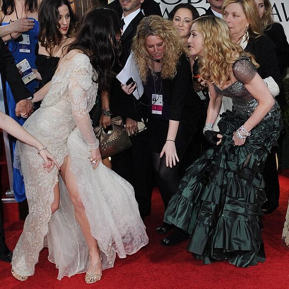 Madonna accidentally stepped on Jessica Biel's elegant dress on the red carpet at the Golden Globes! The singer was walking behind Biel as they stopped and posed for pictures. The two of them both turned to each other and laughed about it. Biel wore a bridal-inspired lace dress with a very high split up the front showing off her legs. She recently got engaged to boyfriend Justin Timberlake but did not have a ring on her finger.

Pictured: Jessica Biel, Madonna
Ref: SPL350789  150112  
Picture by: Splash News

Splash News and Pictures
Los Angeles: 310-821-2666
New York: 212-619-2666
London: 870-934-2666
photodesk@splashnews.com